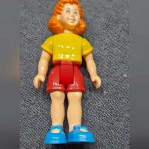 Vibrant Doll with Yellow Top and Red Shorts